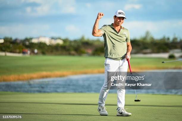 Viktor Hovland of Norway celebrates with a fist pump after his one stroke victory on the 18th hole green during the final round of the Hero World...