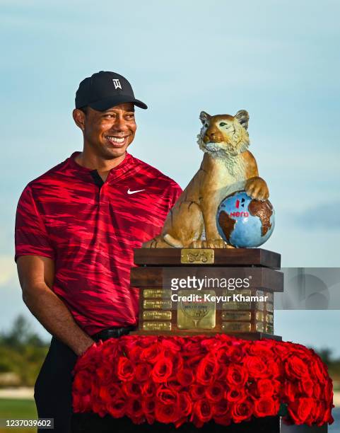 Tournament host Tiger Woods smiles during the trophy ceremony for Viktor Hovland following the final round of the Hero World Challenge at Albany on...
