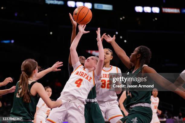 Sage Calvino guard battles for a rebound against St. Vincent-St. Mary during The Chosen - 1's Invitational High School Basketball Showcase at the...