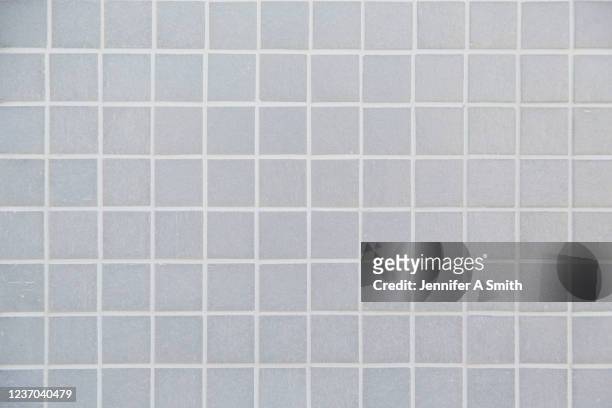 grey tiled wall - domestic bathroom stock pictures, royalty-free photos & images