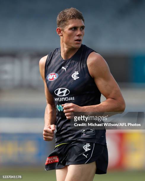 Charlie Curnow of the Blues in action during the Carlton Blues training session at Ikon Park on December 06, 2021 in Melbourne, Australia.