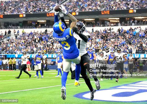 Inglewood, CA Wide receiver Odell Beckham Jr. #3 of the Los Angeles Rams catches a pass in the end zone over cornerback Nevin Lawson of the...