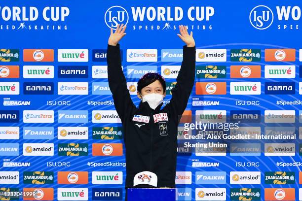 Gold medalist Miho Takagi of Japan stands on the podium after the women's 1500 meter event on Day 3 of the ISU World Cup Speed Skating at Utah...