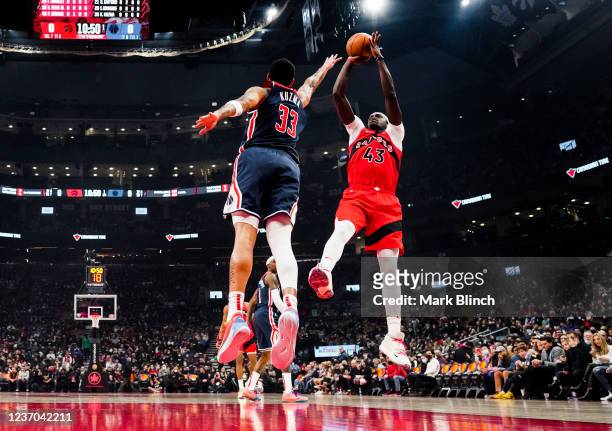 Pascal Siakam of the Toronto Raptors puts up a shot over Kyle Kuzma of the Washington Wizards during the first half of their basketball game at the...