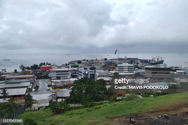The streets of downtown Honiara are quiet on December 6, 2021 as Solomon Islands embattled Prime Minister Manasseh Sogavare faced a no-confidence...