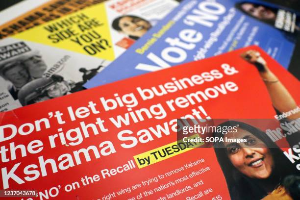 Stack of Kshama Sawant's campaign materials is displayed. Seattle City councilor Sawant who runs under the Trotskyist Socialist Alternative party...