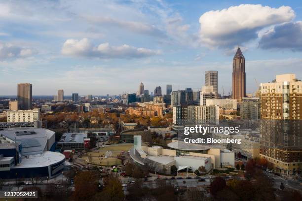 The Bank of America Plaza tower, right, above the World of Coca Cola, the Atlanta Aquarium, and the National Center for Civil and Human Rights...