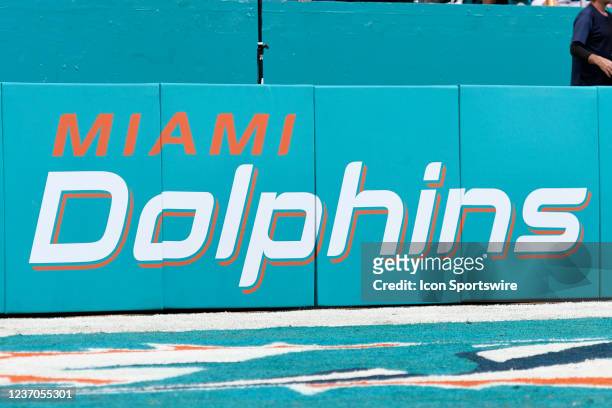 Miami Dolphins logo is seen on the wall behind the end zone before the NFL football game between the New York Giants and the Miami Dolphins on...