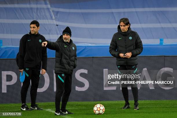 Inter Milan's Italian head coach Simone Inzaghi attends a training session in Madrid on December 6 on the eve of their UEFA Champions League football...