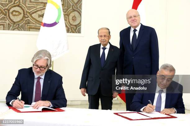 Lebanese Foreign Minister Abdallah Bou Habib and Geofrroi Montpetit, Director of the Francophone Organization sign an agreement in the presence of...