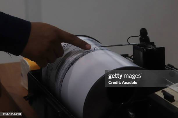 Photo shows a seismograph as officers observe volcanic activity at Gunung Sawur monitoring post in Lumajang Regency, Indonesia on December 6, 2021.