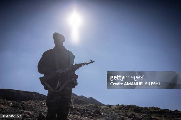 An Amhara militiaman looks on in Mehal Meda, Ethiopia, on December 06, 2021.