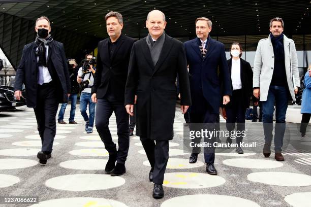 Olaf Scholz of the German Social Democrats , Robert Habeck of the Greens Party and Christian Lindner of the German Free Democrats arrive to speak to...