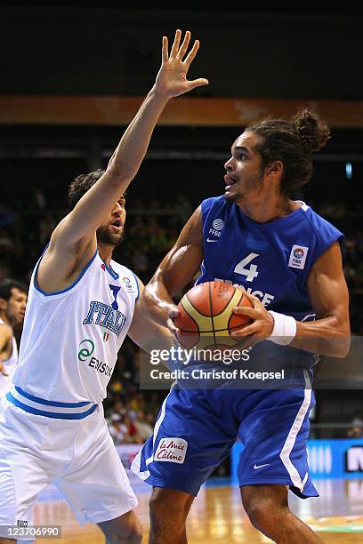 Andrea Bargnani of Italy defends against Joakim Noah of France during the EuroBasket 2011 first round group B match between Italy and France at...