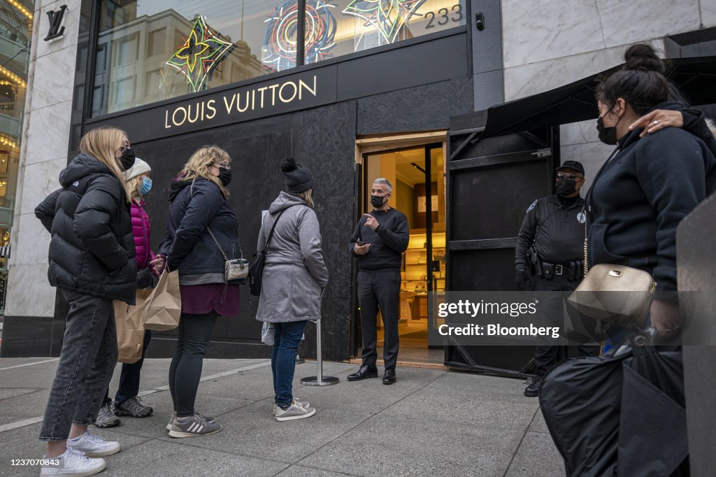 Shoppers wait in line to enter the Louis Vuitton store in Union News  Photo - Getty Images