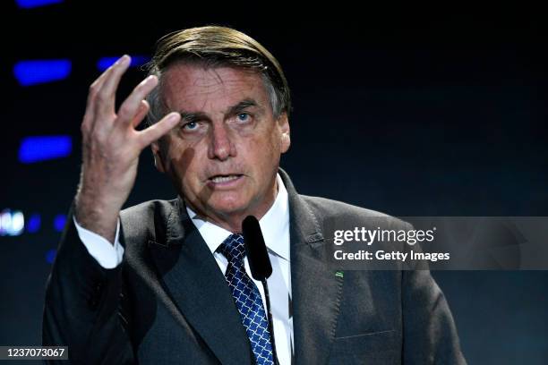 President of Brazil Jair Bolsonaro gestures during a meeting with businessmen promoted by the National Confederation of Industry on December 07, 2021...