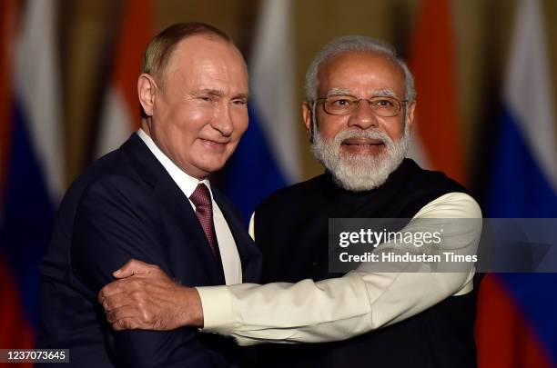 Prime Minister Narendra Modi with Russian President Vladimir Putin prior to their delegation meeting at Hyderabad House, on December 6, 2021 in New...