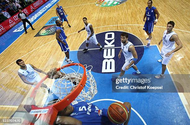 Nicolas Batum of France dunsk the ball during the EuroBasket 2011 first round group B match between Italy and France at Siauliai Arena on September...