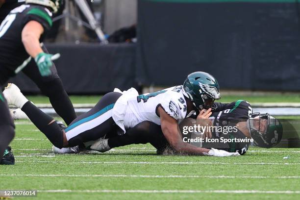 Philadelphia Eagles defensive end Josh Sweat sacks New York Jets quarterback Zach Wilson during the National Football League game between the New...