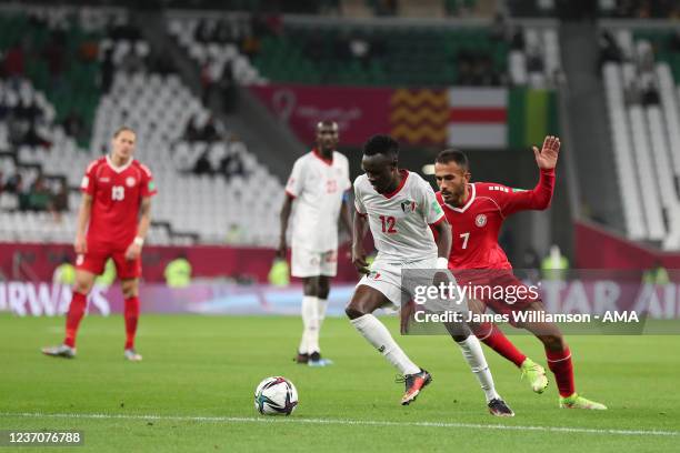 Ahmad Adam of Sudan and Fadel Antar of Lebanon during the FIFA Arab Cup Qatar 2021 Group D match between Lebanon and Sudan at Education City Stadium...