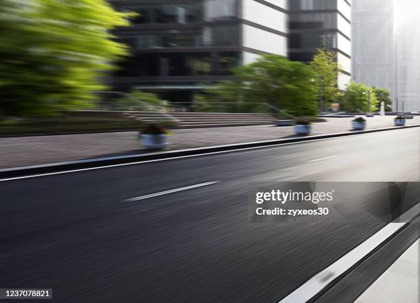 boulevards in shanghai's lujiazui financial district. - city street stock pictures, royalty-free photos & images