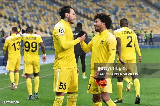 Sheriff's Peruvian defender Gustavo Dulanto and Sheriff's Brazilian midfielder Bruno Felipe Souza da Silva celebrate after the UEFA Champions League...