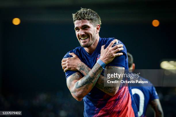 Rodrigo De Paul of Atletico Madrid celebrates after scoring their side's third goal during the UEFA Champions League group B match between FC Porto...