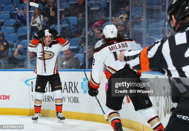 Trevor Zegras reacts to his behind the net pass assisting on a second period goal by Sonny Milano of the Anaheim Ducks during an NHL game against the...