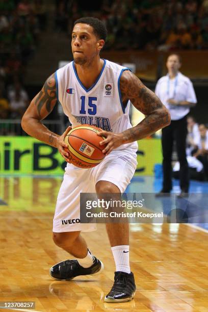 Daniel Hackett of Italy passes the ball during the EuroBasket 2011 first round group B match between Italy and France at Siauliai Arena on September...