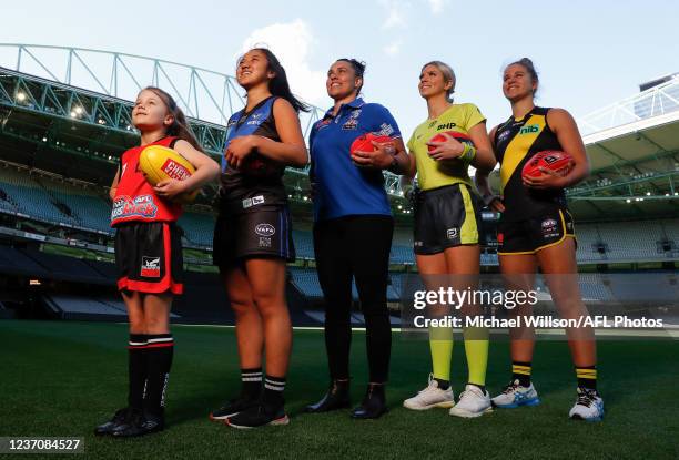 Abigail Barwick, Angelena Roan, Kirby Bentley, Greta Miller and Ellie McKenzie pose for a photograph during the AFLW Women's Football Vision Launch...