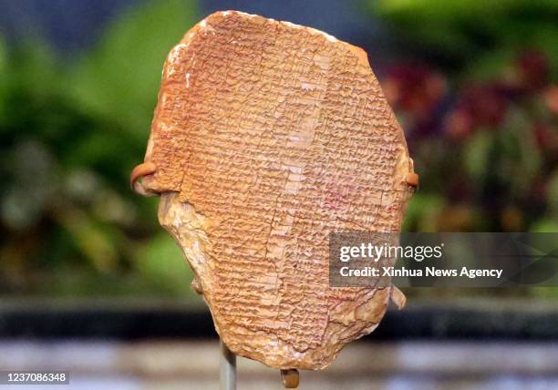 The retrieved Gilgamesh's Dream tablet is displayed at the headquarters of the Iraqi Ministry of Foreign Affairs in Baghdad, Iraq, Dec. 7. 2021. Iraq...