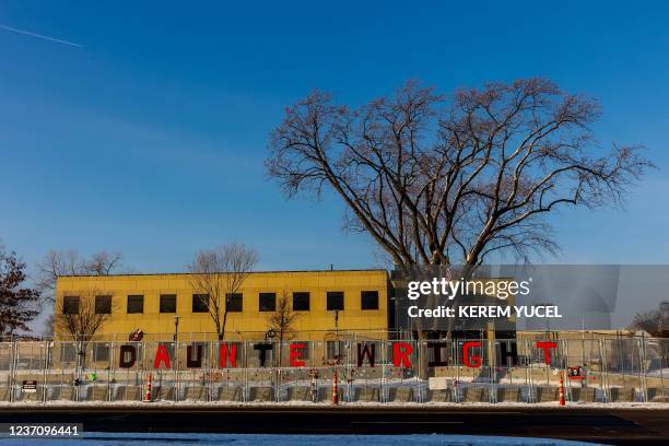 Daunte Wright's name adorns a security fence outside the Brooklyn Central Police Station in Brooklyn Center, Minnesota, on December 8 as the trial of...