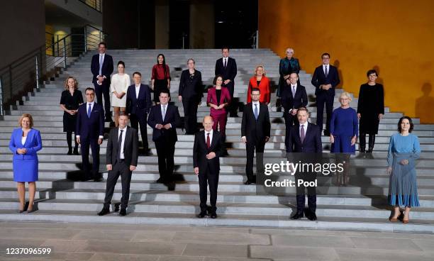 German Chancellor Olaf Scholz poses with his cabinet for a group picture after the first cabinet meeting of new German government at the Chancellery...