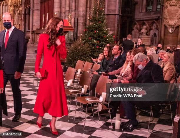 Catherine, Duchess of Cambridge seen talking with Philippa Matthews, James Middleton, guest and Carole and Michael Middleton as they attend the...