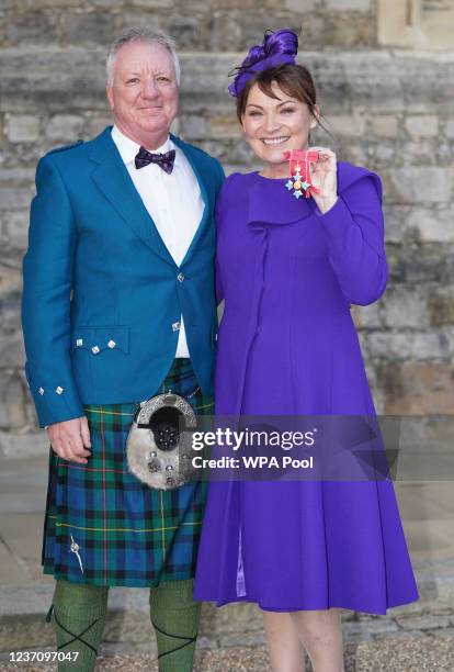 Lorraine Kelly with husband Steve Smith after being made a CBE by the Princess Royal during a investiture ceremony at Windsor Castle on December 8,...