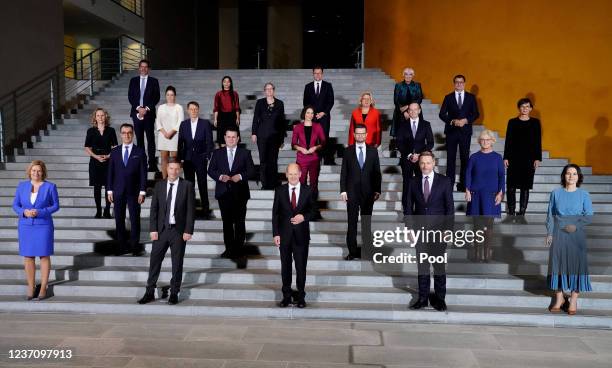 German Chancellor Olaf Scholz poses with his cabinet for a group picture after the first cabinet meeting of new German government at the Chancellery...