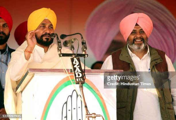 Punjab Chief Minister Charanjit Singh Channi addresses the gathering during a rally at Grain Market Rama Mandi, on December 8, 2021 in Bathinda,...