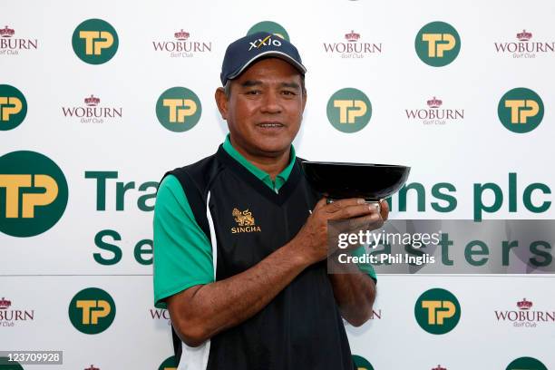 Boonchu Ruangkit of Thailand poses with the trophy after the final round of the Travis Perkins plc Senior Masters played at the Duke's Course, Woburn...