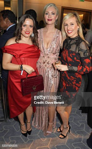 Olivia Cheung, Hayley McQueen and Julie Ann Trainor attend the WOTC New Faces Awards 2021 at The Berkeley Hotel on December 8, 2021 in London,...