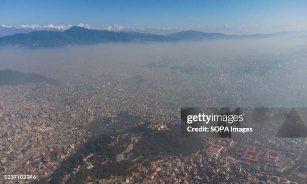 Aerial view of Thick toxic smog air pollution over the Kathmandu valley. Due to air pollution, a majority of people in and around Kathmandu valley...