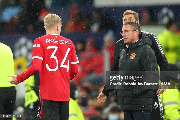 Ralf Rangnick the interim / caretaker manager / head coach of Manchester United talks to Donny van de Beek of Manchester United during the UEFA...