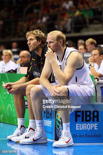 Dirk Nowitzki and Chris Kaman of Germany look dejected during the EuroBasket 2011 first round group B match between Germany and Serbia at Siauliai...