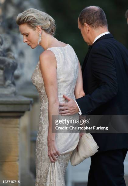 Princess Charlene of Monaco and Prince Albert II of Monaco attend the Yorkshire Variety Club Golden Ball at Harewood House on September 4, 2011 in...