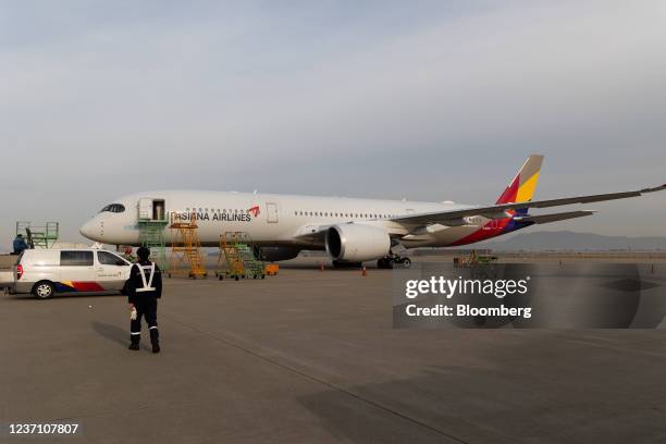 An Asiana Airlines Inc. Aircraft parked outside the company's hanger at Incheon International Airport in Incheon, South Korea, on Thursday, Dec. 9,...