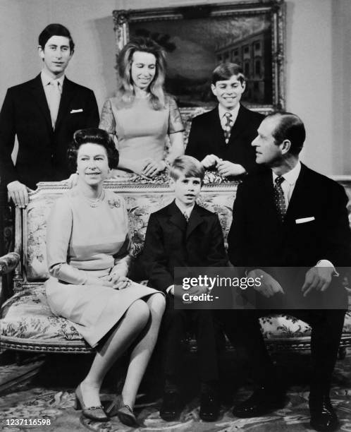 Queen Elizabeth II and Prince Philip, Duke of Edinburgh, pose with their children,Princes Charles , Andrew and Edward and Princess Anne as they...