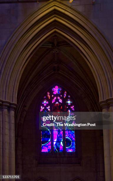 Piece of moon rock is embedded in the Space WIndow, located on the south side of the National Cathedral. It is pointed out by a docent during the tea...