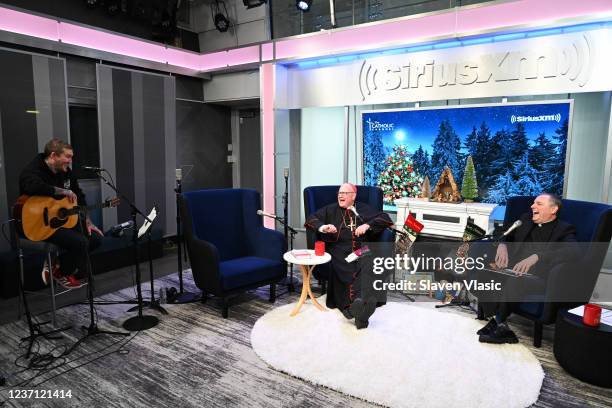 Musician Brian Fallon with SiriusXM hosts Cardinal Timothy Dolan and Father Dave Dwyer attend Cardinal Dolan's Annual SiriusXM Christmas Special On...