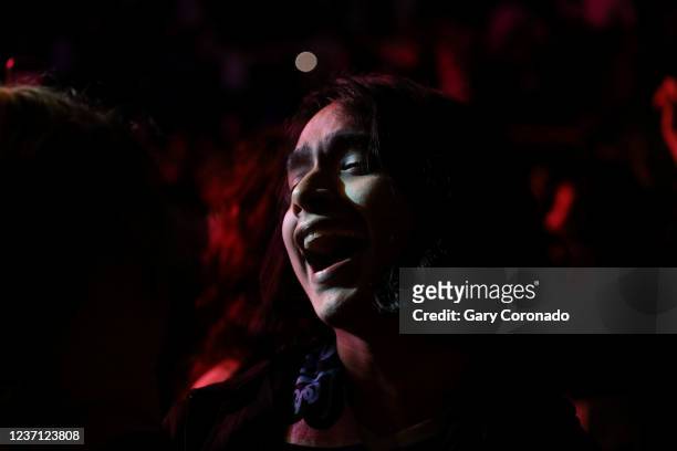 Fernando Zamora of Cape Coral, Florida, sings along with the cumbia group Los Ángeles Azules during their 40 Years anniversary tour at the Hertz...