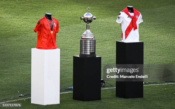 Copa Libertadores trophy and jerseys are displayed on the pitch before the "Copa Eterna" celebrations at Estadio Monumental Antonio Vespucio Liberti...
