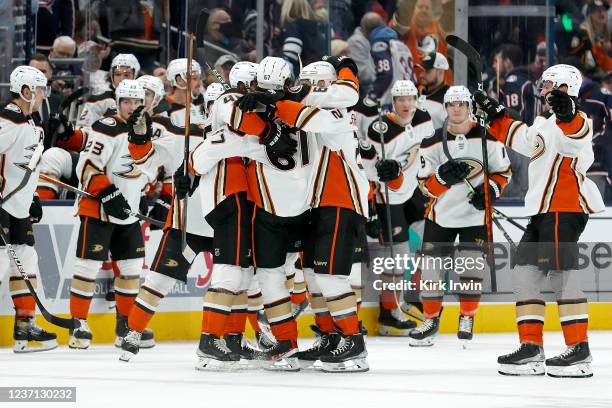 Rickard Rakell of the Anaheim Ducks is congratulated by teammates after scoring the game-winning goal in a shootout against the Columbus Blue Jackets...